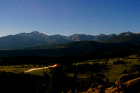Long's Peak by Moonlight with Star Trails and Car Trails
